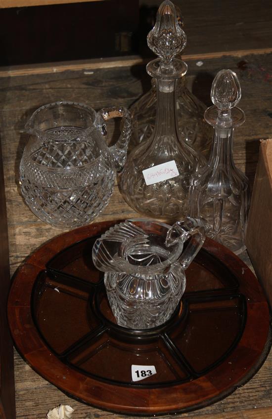 Four cut glass decanters and a jug